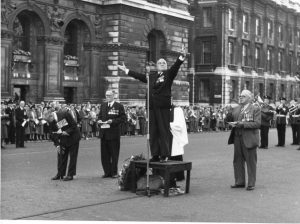 Arthur Caiger DCM leads the hymn singing in Whitehall after the 1955 parade.
