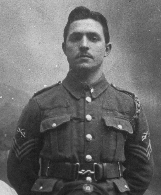 Sgt Moyse wearing the crossed swords above his chevrons to denote his qualification as a PT instructor